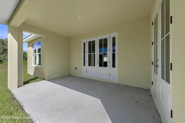 view of patio featuring french doors