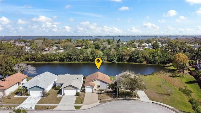 bird's eye view featuring a residential view and a water view