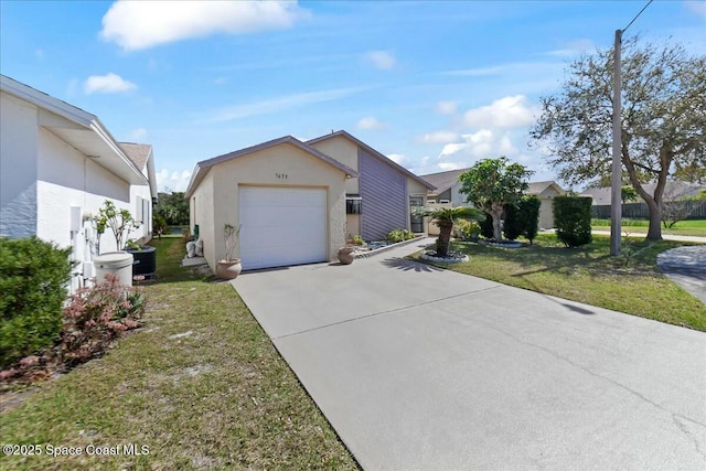 view of front of house featuring stucco siding, driveway, central AC, a front yard, and a garage