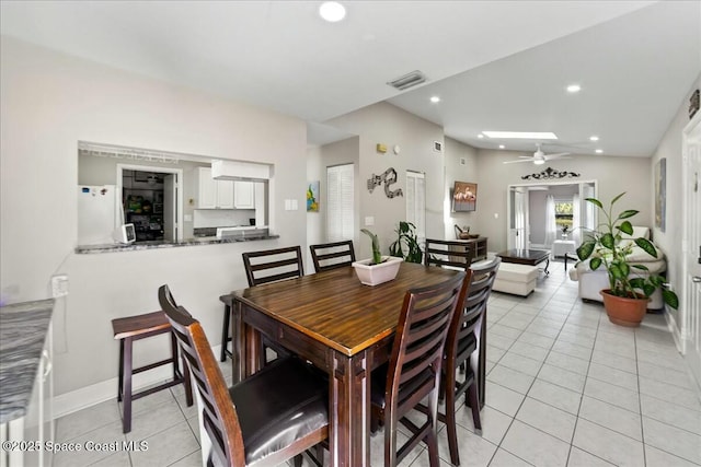 dining area featuring visible vents, light tile patterned flooring, recessed lighting, ceiling fan, and vaulted ceiling