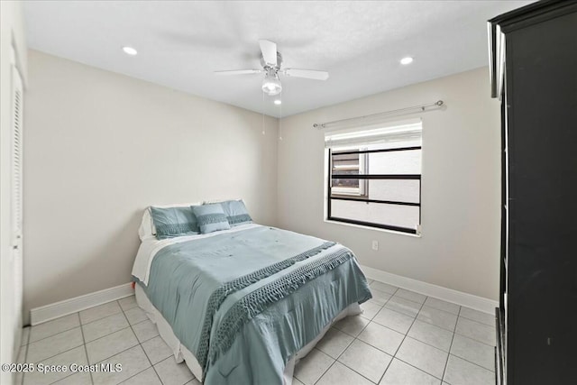 bedroom with light tile patterned flooring, recessed lighting, a ceiling fan, and baseboards