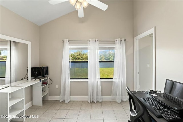 office with light tile patterned floors, baseboards, lofted ceiling, and a ceiling fan