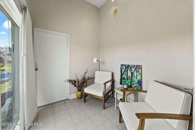 living area with light tile patterned floors