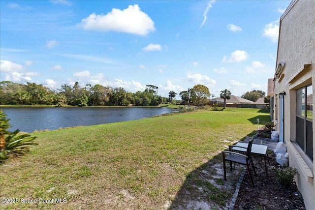 view of yard with a water view