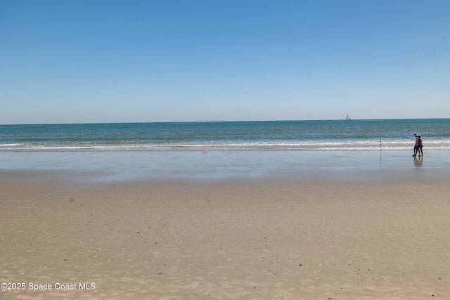 property view of water with a beach view