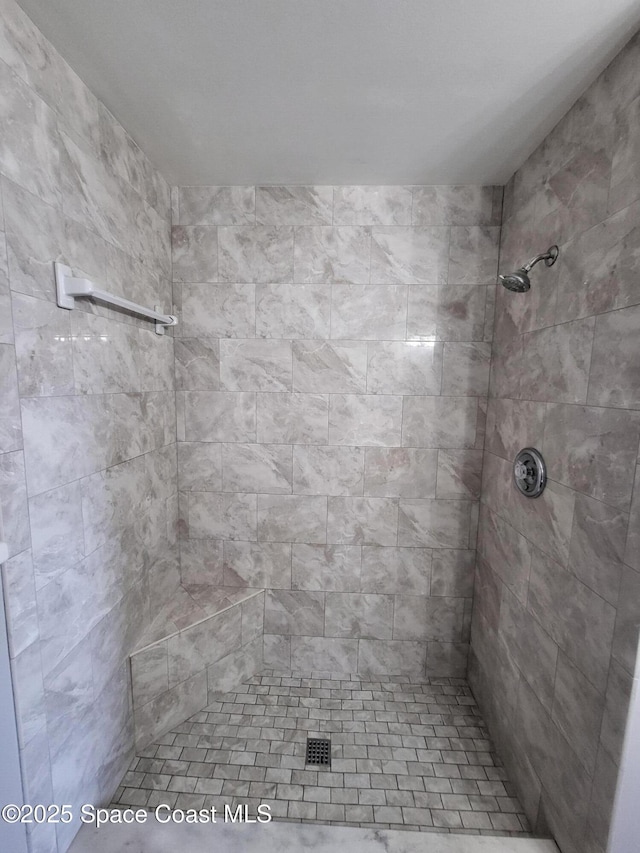 211 Cherie Down Ln, Cape Canaveral, FL 32920 - bathroom featuring tiled shower