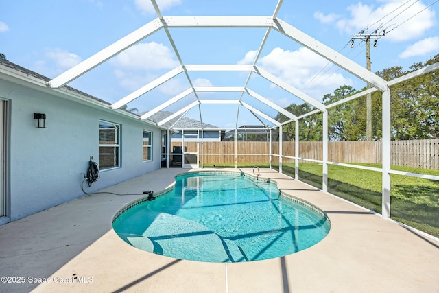 view of swimming pool featuring a patio, a fenced backyard, and a fenced in pool