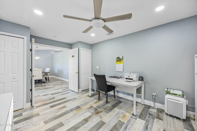 office area with visible vents, a ceiling fan, recessed lighting, light wood finished floors, and baseboards