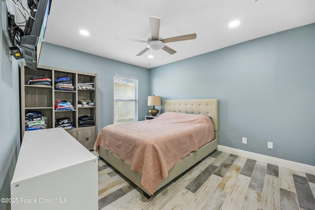 bedroom with recessed lighting, baseboards, and wood finished floors