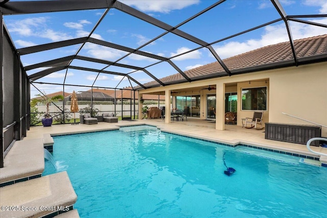 view of pool with a ceiling fan, an outdoor living space, a patio, a fenced in pool, and a lanai