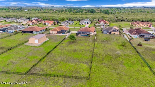 bird's eye view with a residential view and a forest view