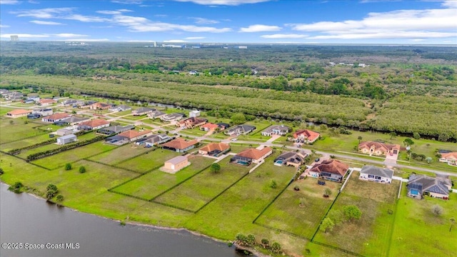 aerial view with a residential view and a water view