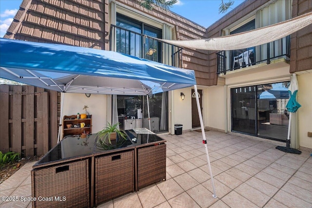 view of patio / terrace featuring a balcony