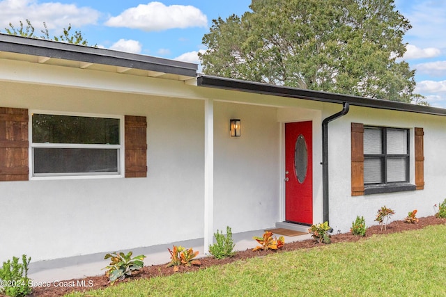 view of front of property featuring stucco siding