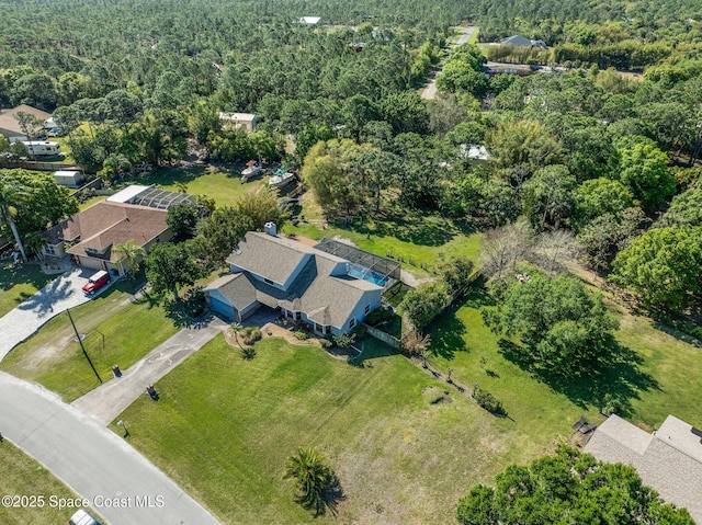 aerial view featuring a forest view