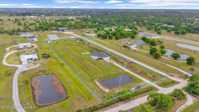 bird's eye view with a rural view