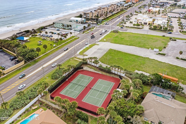 bird's eye view featuring a beach view and a water view