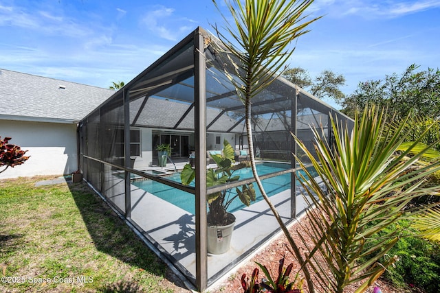 pool featuring a patio area and a lanai