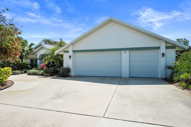 garage with driveway