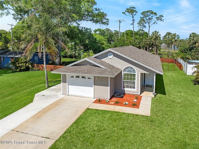 view of front of home featuring a shingled roof, a front lawn, fence, concrete driveway, and a garage