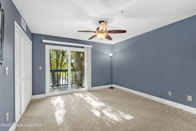 7667 N Wickham Rd Unit 712, Melbourne, FL 32940 - carpeted spare room with ceiling fan, baseboards, and a pendent fire sprinkler