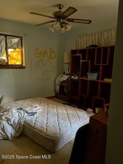 bedroom featuring ceiling fan