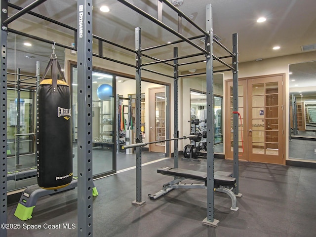 workout area with visible vents, recessed lighting, and french doors