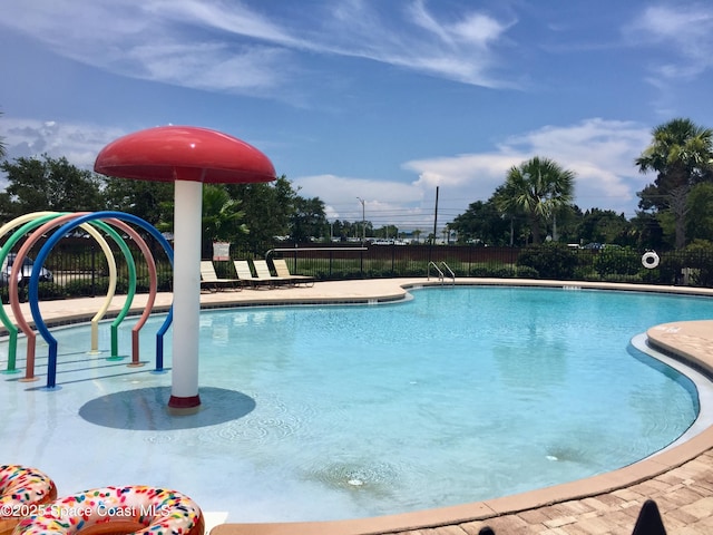 pool featuring fence