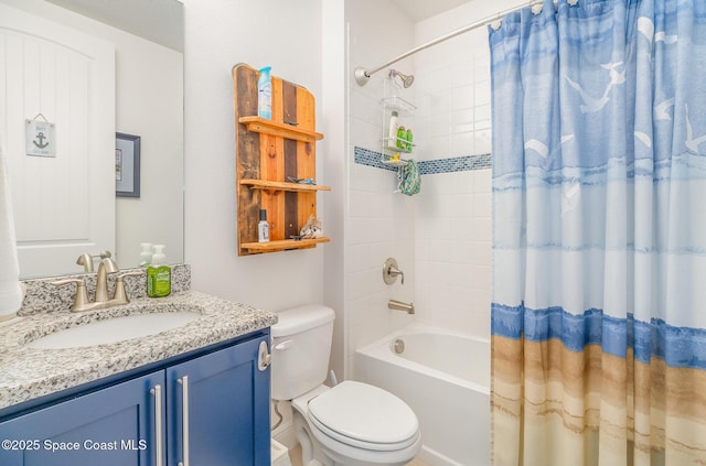 full bath featuring toilet, vanity, and shower / bath combo