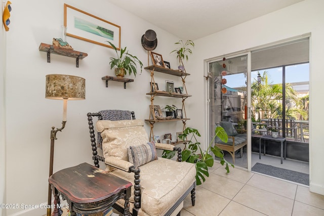 sitting room with light tile patterned floors