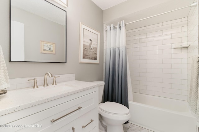 full bathroom with marble finish floor, toilet, vanity, and shower / bath combo