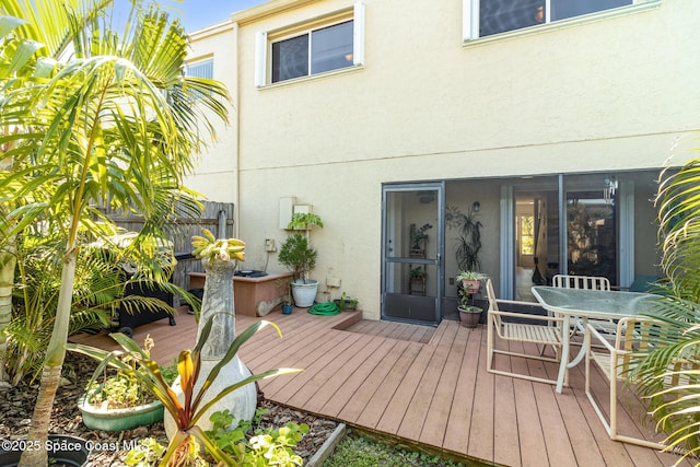 deck with outdoor dining space