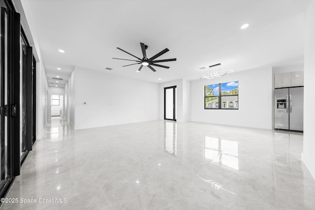 unfurnished room with recessed lighting, marble finish floor, and a ceiling fan