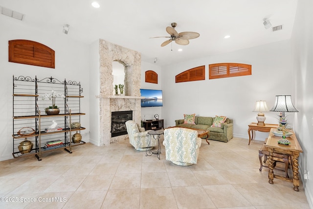 3338 Cappio Dr, Melbourne, FL 32940 - living area featuring visible vents, baseboards, a ceiling fan, a high end fireplace, and recessed lighting