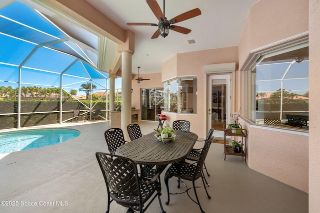 3338 Cappio Dr, Melbourne, FL 32940 - view of patio featuring outdoor dining area, an outdoor pool, glass enclosure, and a ceiling fan