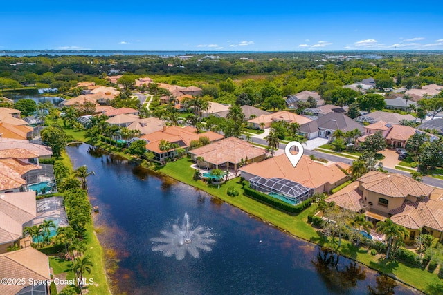 3338 Cappio Dr, Melbourne, FL 32940 - drone / aerial view featuring a water view and a residential view