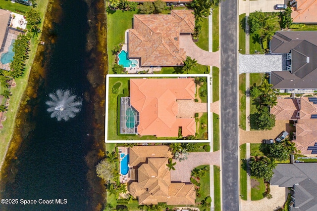 3338 Cappio Dr, Melbourne, FL 32940 - drone / aerial view with a water view