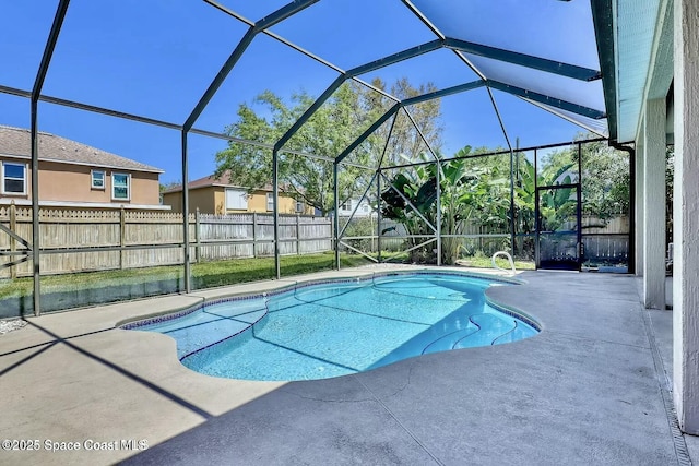 4026 Four Lakes Dr, Melbourne, FL 32940 - view of swimming pool featuring a fenced backyard, a fenced in pool, glass enclosure, and a patio