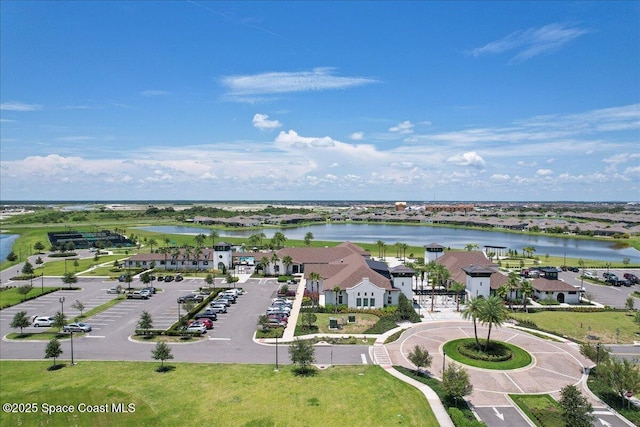 aerial view featuring a residential view and a water view