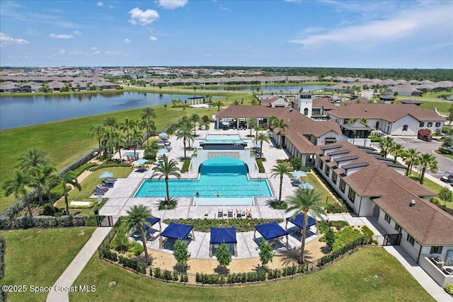 aerial view featuring a water view and a residential view