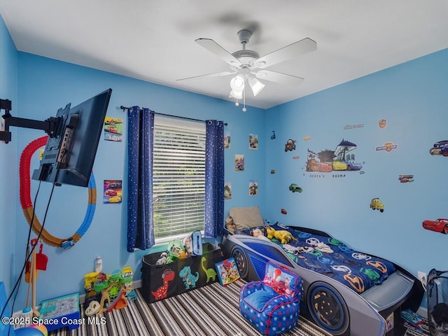 bedroom featuring ceiling fan