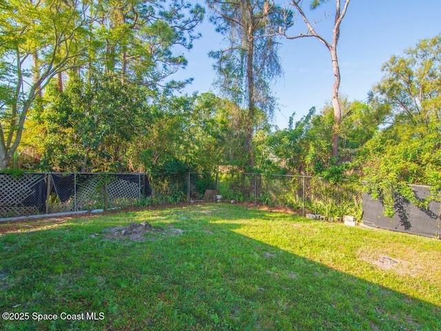 view of yard featuring fence