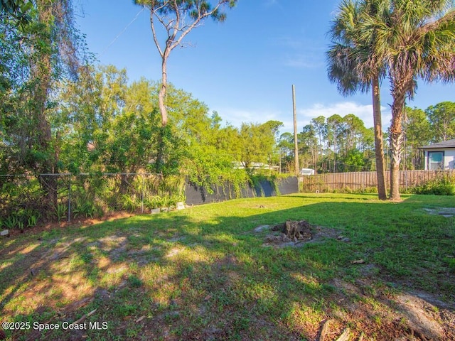 view of yard with fence