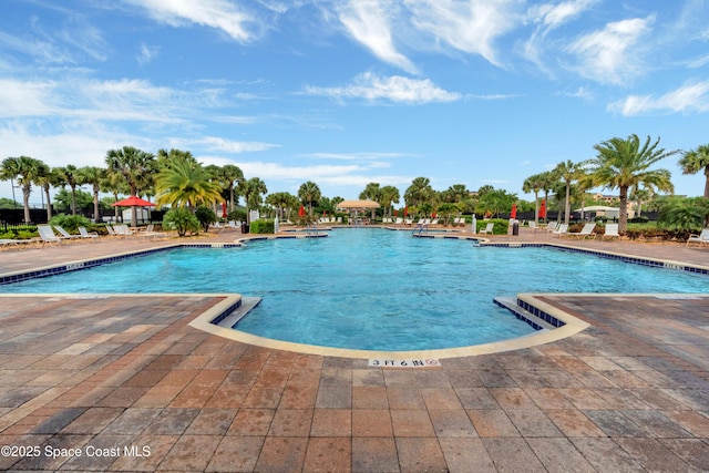 3980 Funston Cir, Melbourne, FL 32940 - community pool featuring a patio area