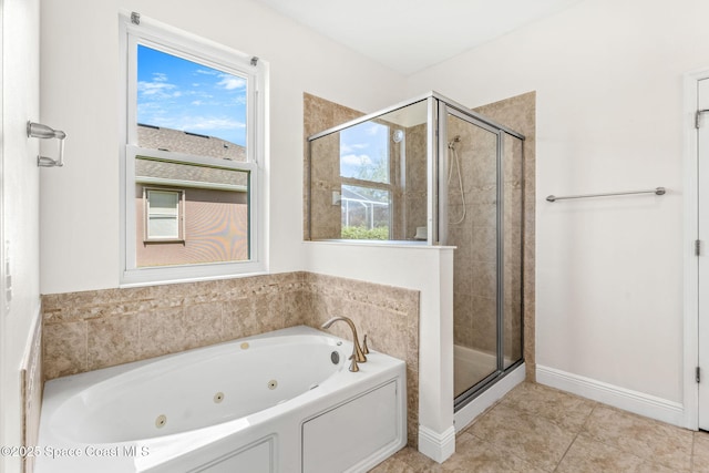 3980 Funston Cir, Melbourne, FL 32940 - full bathroom with a tub with jets, tile patterned flooring, and a stall shower