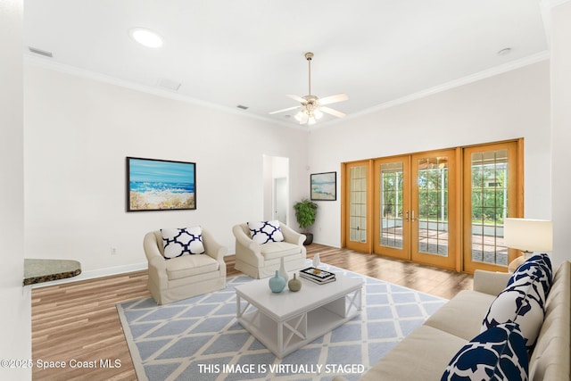 3980 Funston Cir, Melbourne, FL 32940 - living area with wood finished floors, french doors, visible vents, baseboards, and ornamental molding