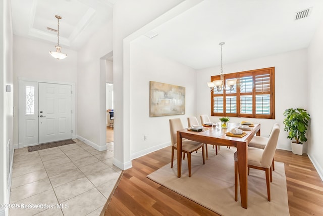 3980 Funston Cir, Melbourne, FL 32940 - dining room featuring baseboards, a wealth of natural light, a notable chandelier, and visible vents