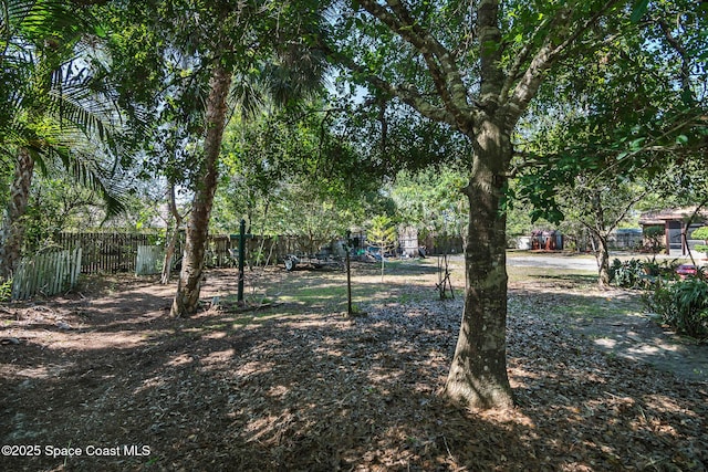 view of yard featuring fence