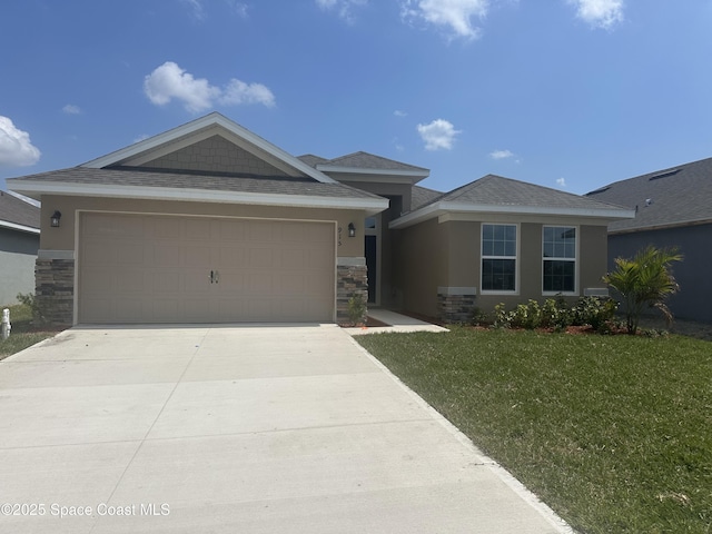 view of front of house with a front yard, an attached garage, stucco siding, concrete driveway, and stone siding