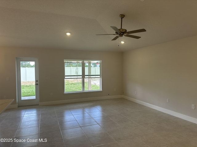 unfurnished room with tile patterned floors, baseboards, ceiling fan, and recessed lighting